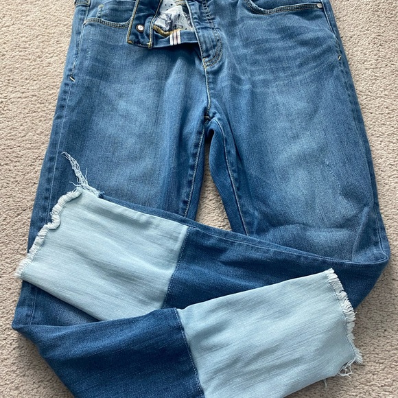 Distresses ankle bottom with a lighter color denim on back. Script - Picture 5 of 5